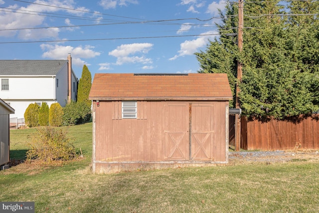 view of outdoor structure with a yard