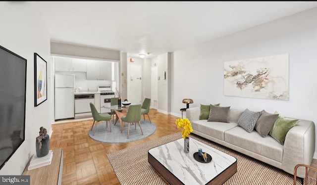 living room with light parquet flooring