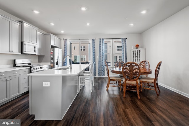 8510 Randell Ridge Rd, Frederick, MD 21704 - kitchen featuring appliances with stainless steel finishes, a sink, gray cabinetry, a center island with sink, and recessed lighting