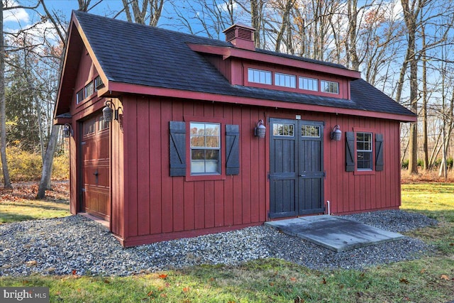 view of outbuilding with a garage