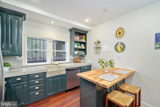 kitchen with sink, blue cabinetry, dishwasher, butcher block countertops, and dark hardwood / wood-style flooring