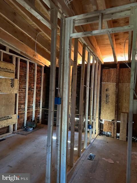 miscellaneous room featuring lofted ceiling