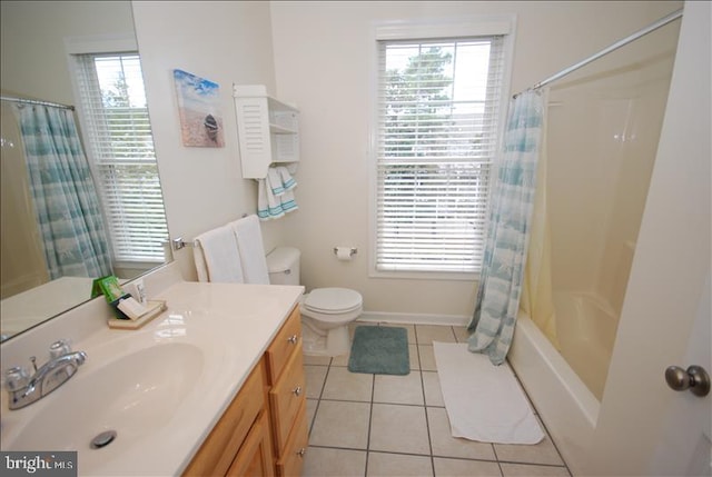 full bathroom featuring tile patterned flooring, vanity, shower / bath combo with shower curtain, and toilet