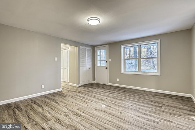 empty room with light wood-type flooring