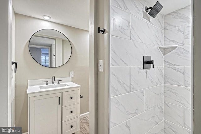 bathroom with wood-type flooring and vanity