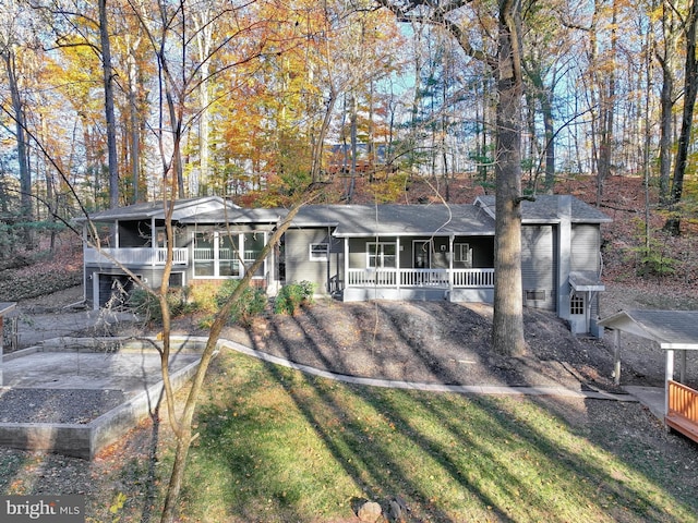 ranch-style house with a front lawn