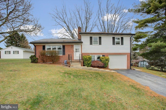 split level home featuring a garage and a front yard