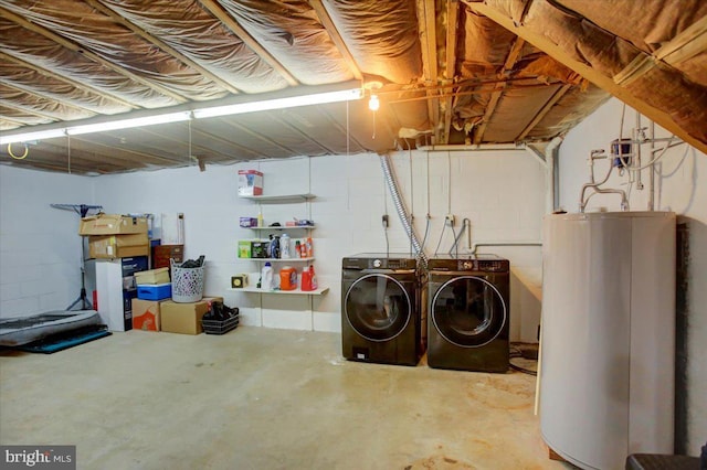 basement with separate washer and dryer and water heater