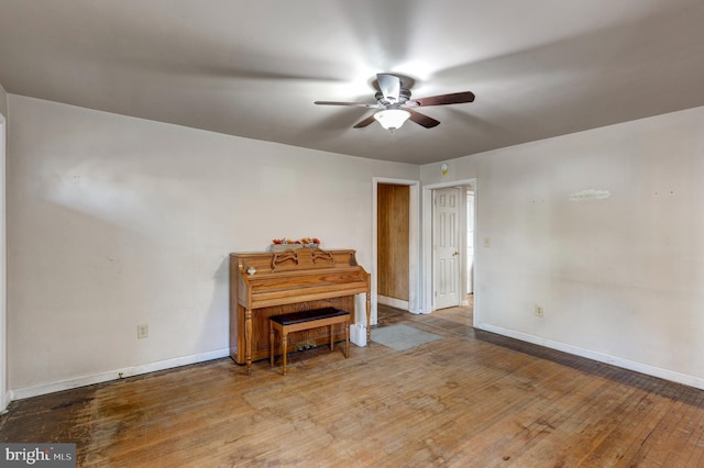 miscellaneous room featuring ceiling fan and hardwood / wood-style floors