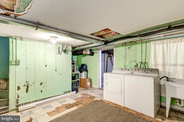 clothes washing area with independent washer and dryer