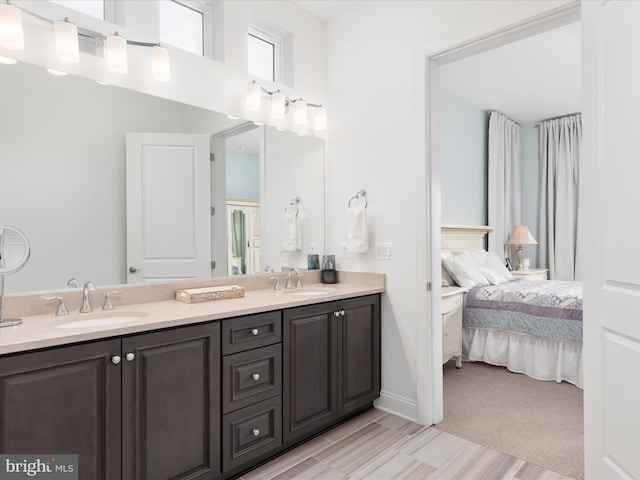 bathroom featuring hardwood / wood-style floors and vanity