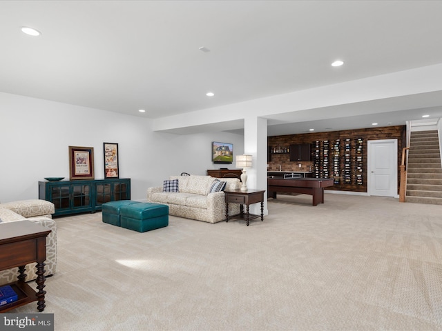 carpeted living room featuring pool table