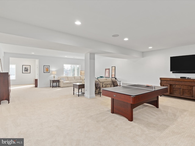 game room with light colored carpet