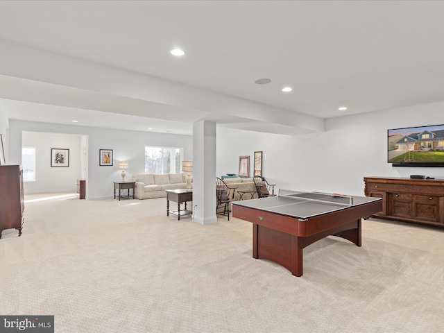 game room featuring light colored carpet