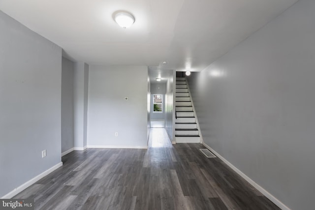 interior space with dark wood-type flooring