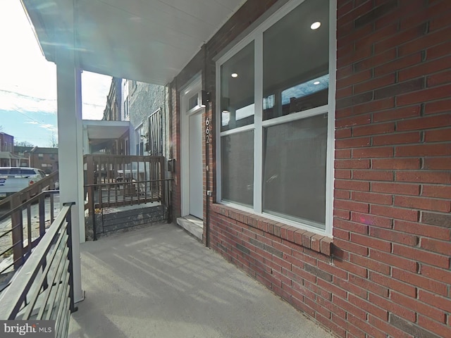 balcony featuring covered porch