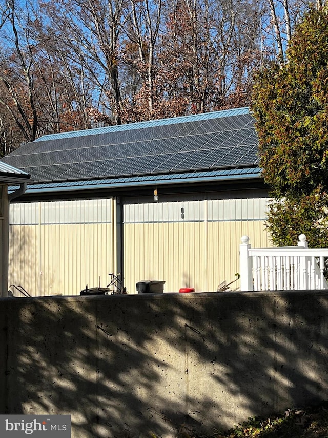 exterior space featuring solar panels