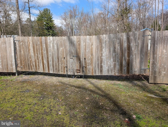 view of yard featuring fence