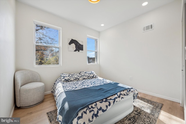 bedroom featuring light hardwood / wood-style flooring