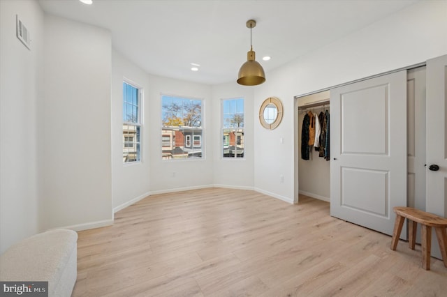 interior space with light hardwood / wood-style flooring