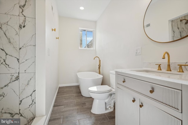 bathroom featuring hardwood / wood-style floors, vanity, and toilet