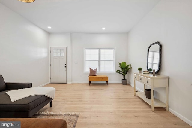 sitting room with light hardwood / wood-style floors