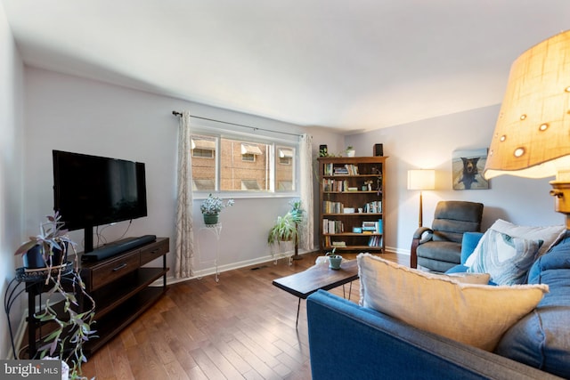 living room featuring dark hardwood / wood-style flooring