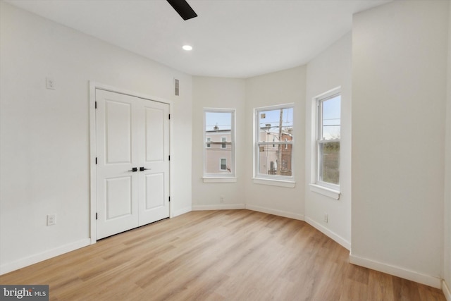 empty room with light wood-type flooring