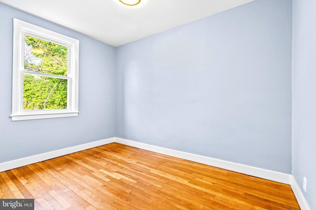 unfurnished room featuring light wood-type flooring