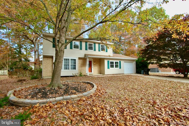 front facade with a garage