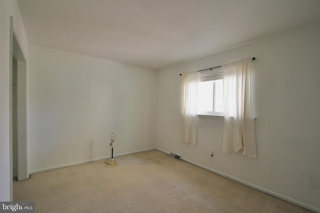 view of carpeted spare room