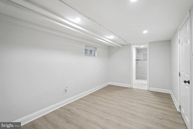 basement with light wood-type flooring