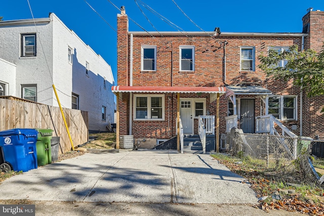 multi unit property featuring a porch