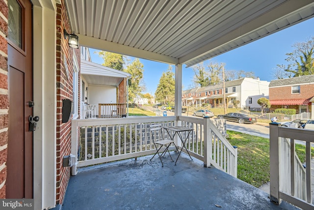 balcony featuring a porch