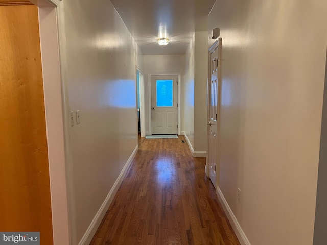 hallway featuring hardwood / wood-style flooring