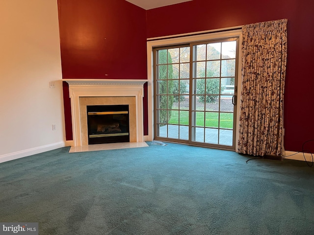 unfurnished living room with carpet floors