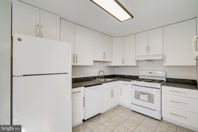 kitchen featuring white appliances, sink, light tile patterned floors, and white cabinets