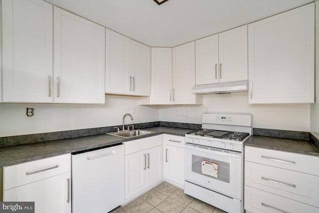 kitchen with white cabinets, white appliances, and sink