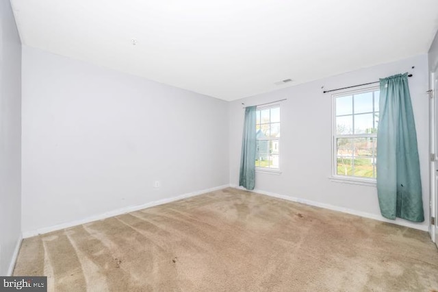 view of carpeted spare room