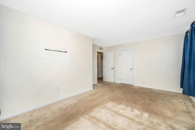 unfurnished room with carpet flooring