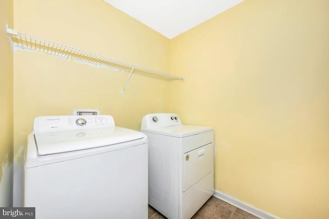 laundry area with washer and clothes dryer