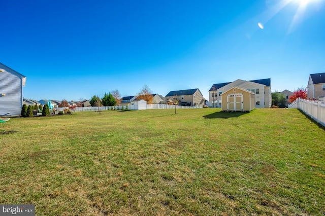 view of yard with a storage shed