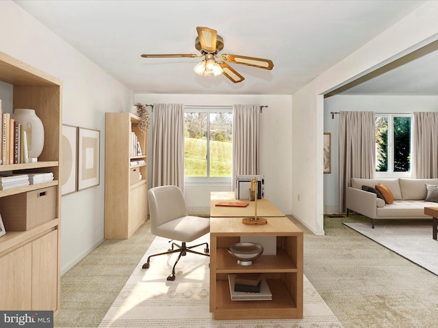 interior space featuring ceiling fan