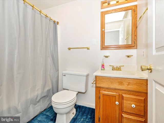 full bathroom with vanity, shower / bath combo, and toilet