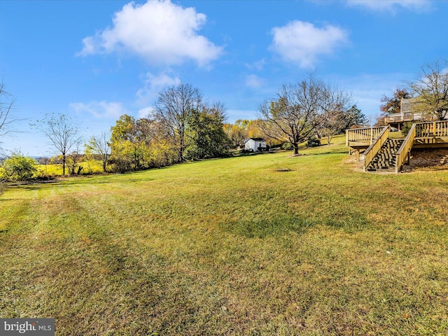 view of yard with a deck