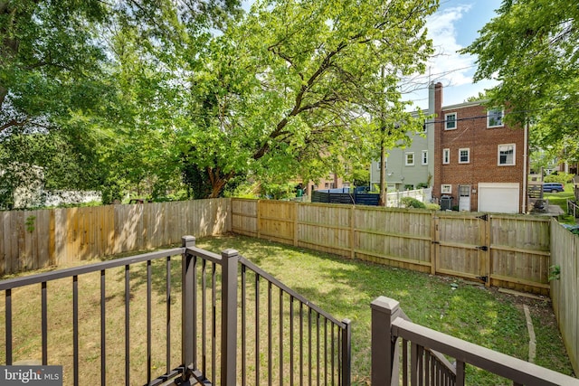 view of yard featuring a garage