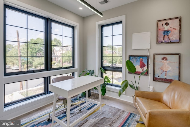 home office featuring light hardwood / wood-style floors