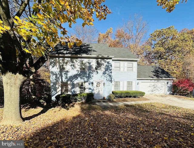 colonial home featuring a garage