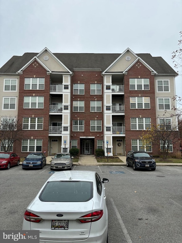 2801 Forest Run Dr Unit 1-204, District Heights, MD 20747 - view of building exterior featuring uncovered parking