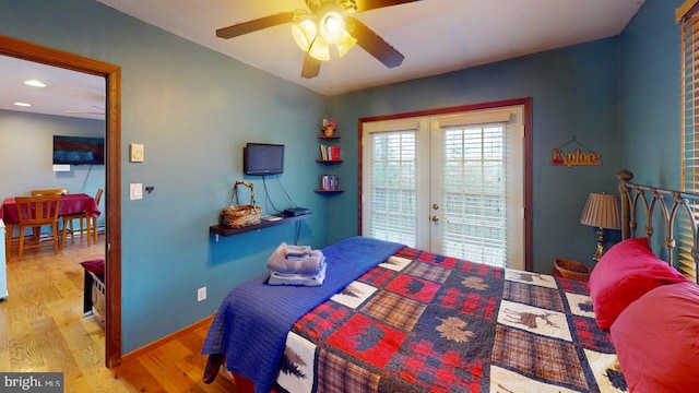 bedroom with ceiling fan, access to exterior, light wood-type flooring, and french doors